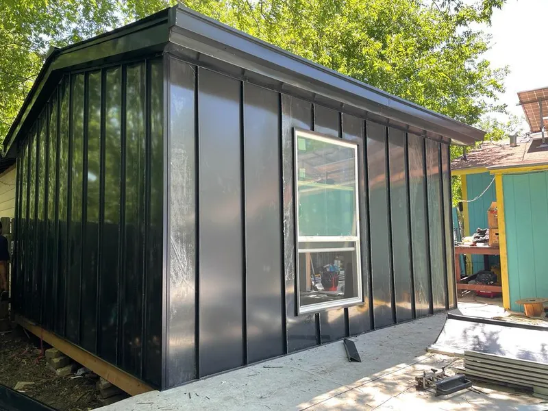 Black standing seam metal wall panels for Metal Roof Installation in Milwaukee