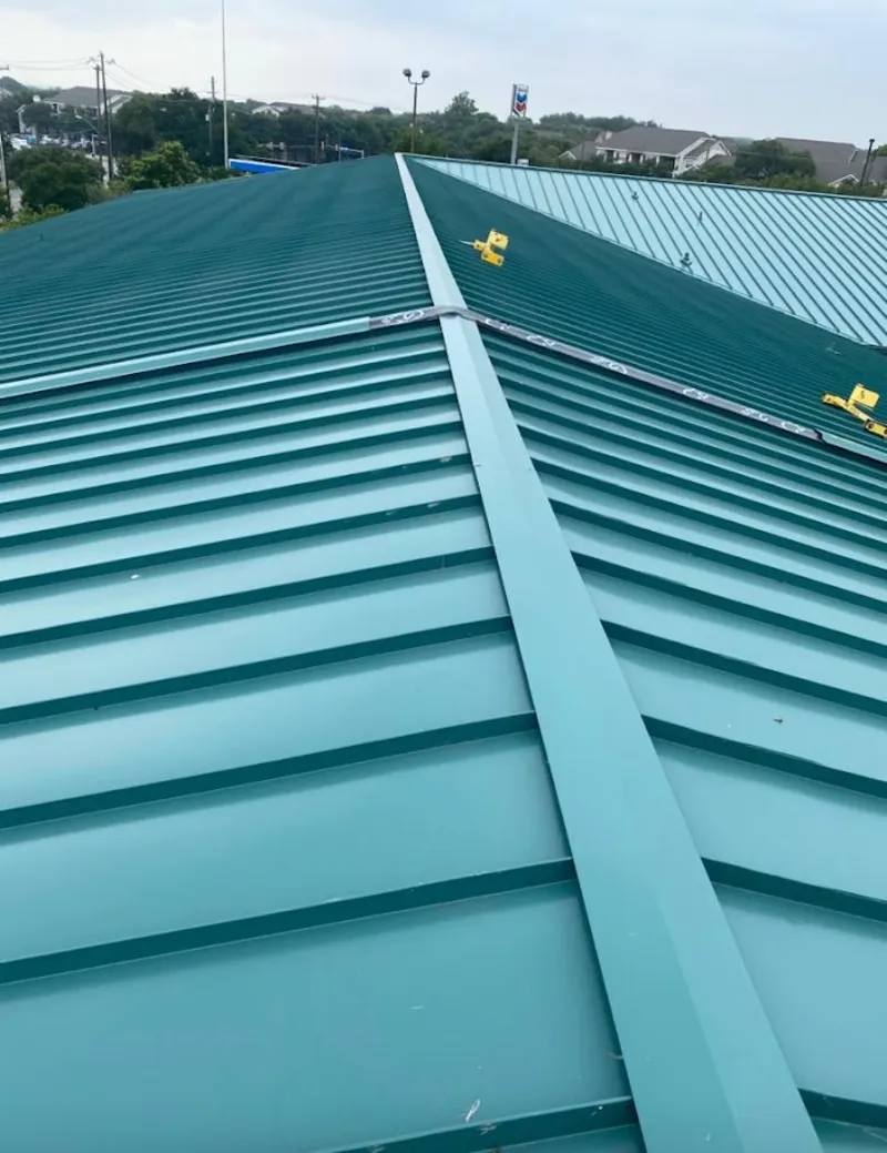Green commercial metal roof ridge and valley for Metal Roof Repair in Milwaukee