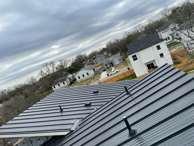 Standing seam metal roof panels with vents for Skylight Repair in Milwaukee